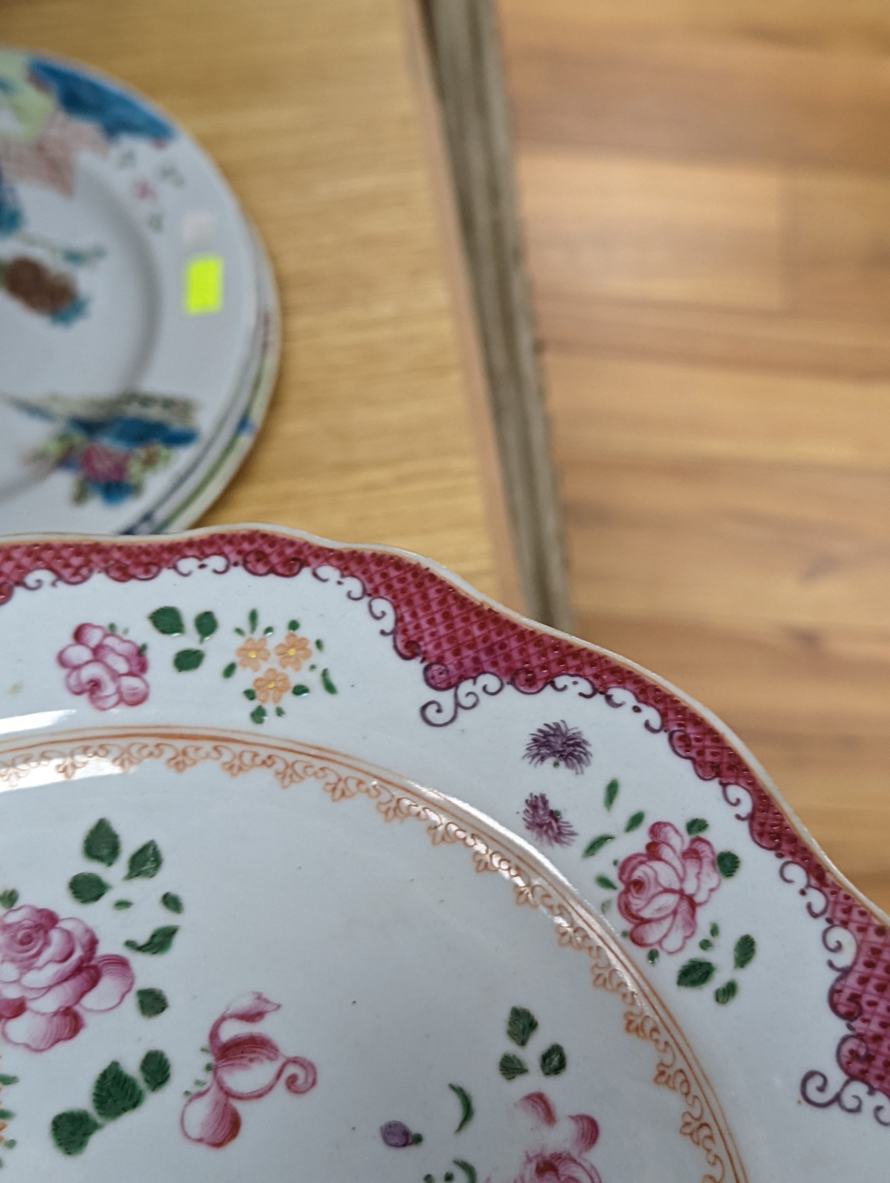 Two pairs of 18th century Chinese famille rose plates and an Imari plate, 26cm